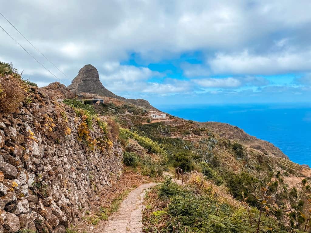Roque de Taborno hiking trail on Tenerife with ocean views and rugged mountain scenery.